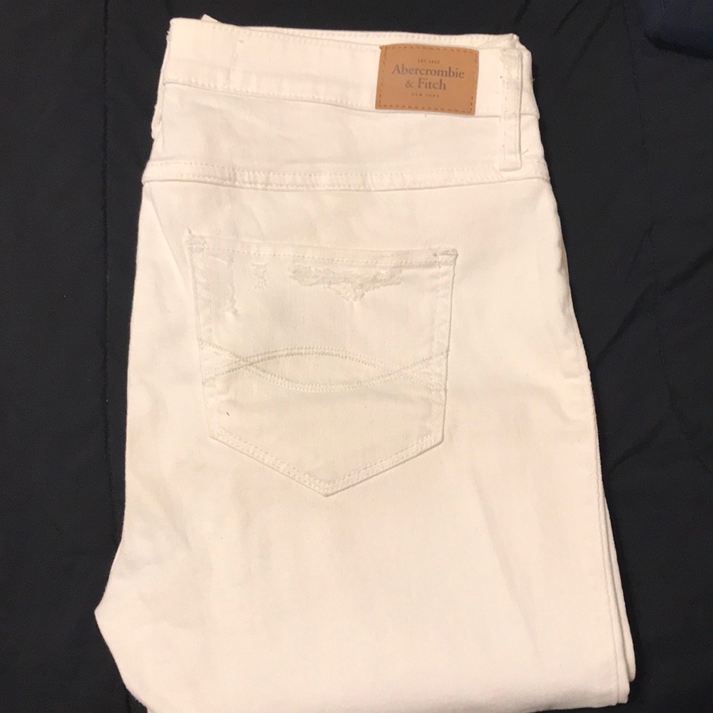 All white ripped skinny jeans